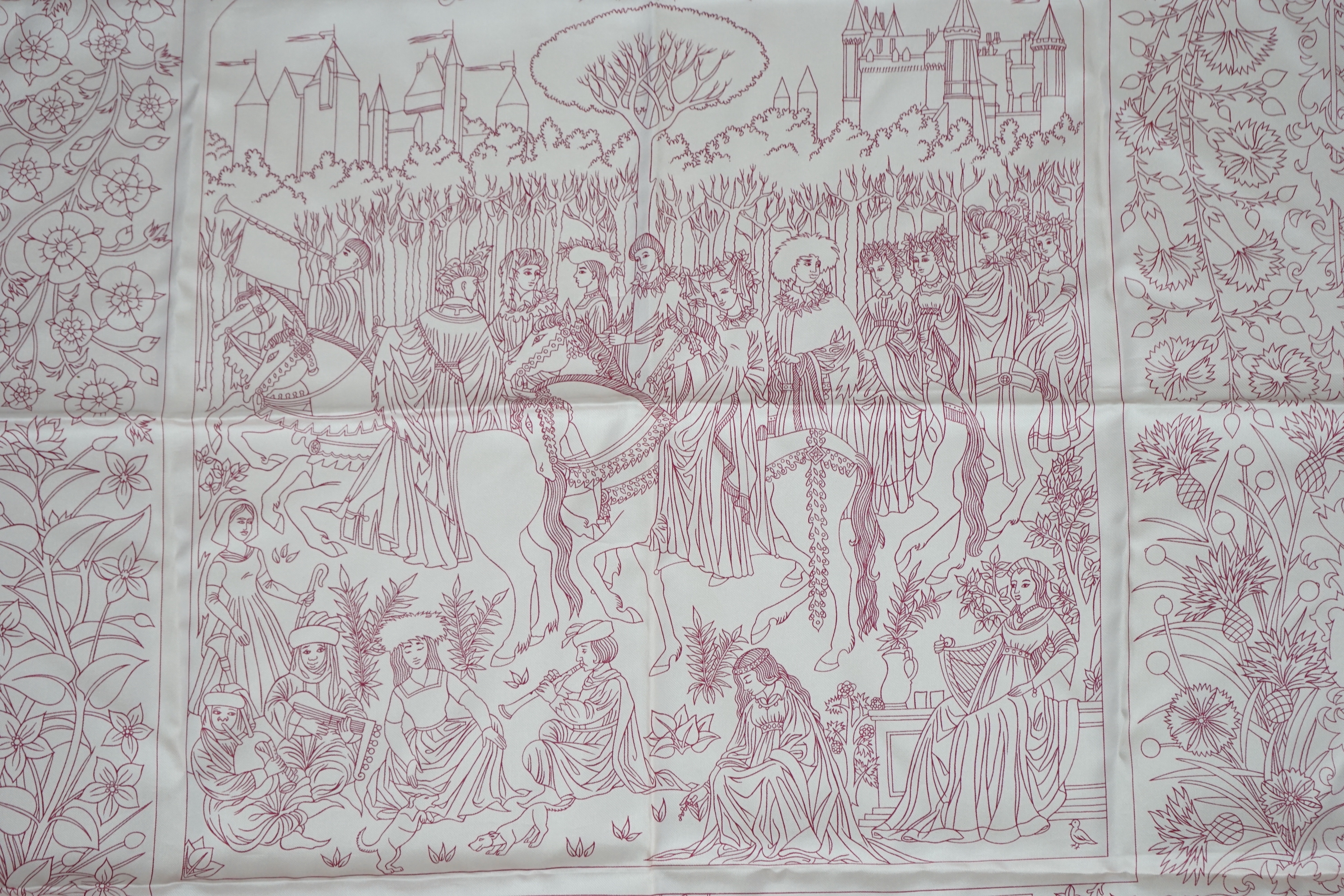 A Hermès Cavalcade de Mai printed light pink silk scarf, 90cm x 90cm